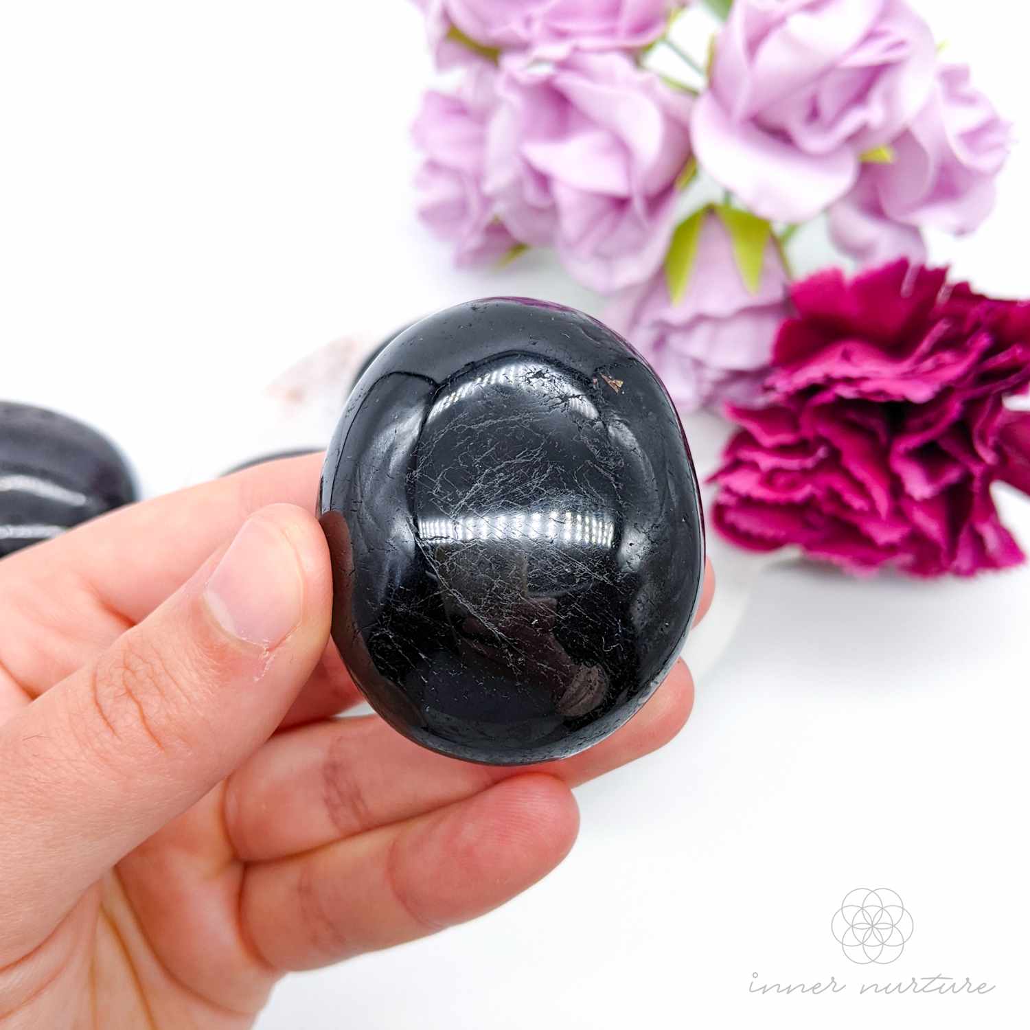 black tourmaline palm stone - inner nurture online crystal shop