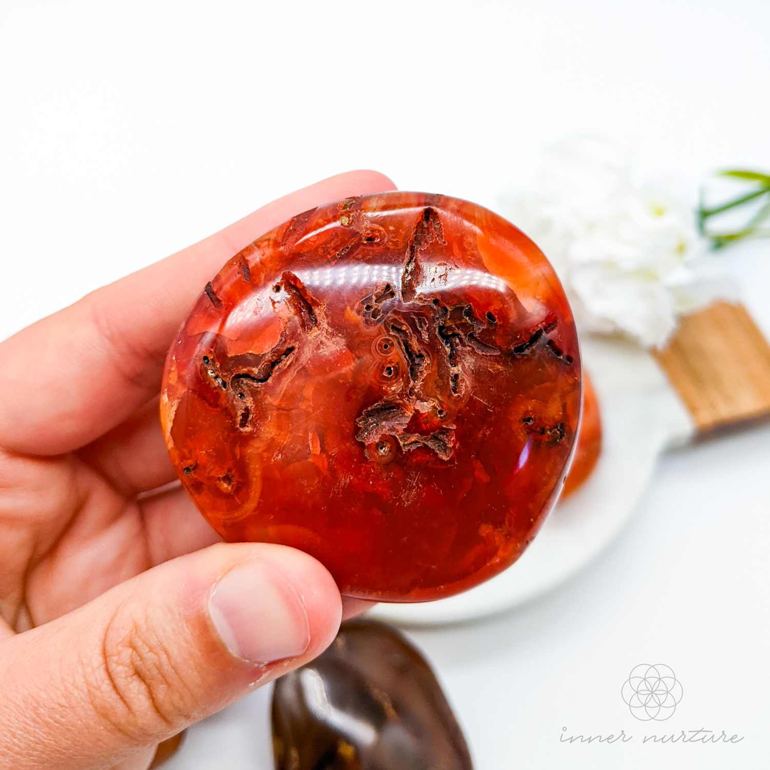 carnelian palm stone - inner nurture online crystal shop